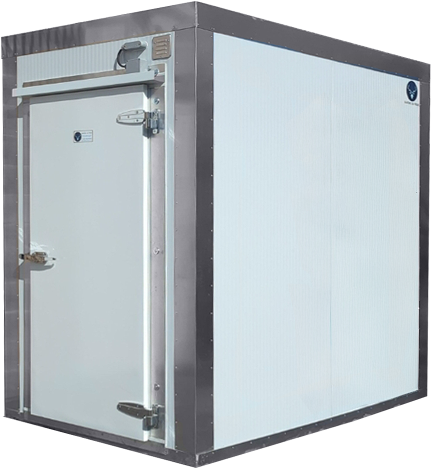 Compact cold room installed outdoors against a brick wall.